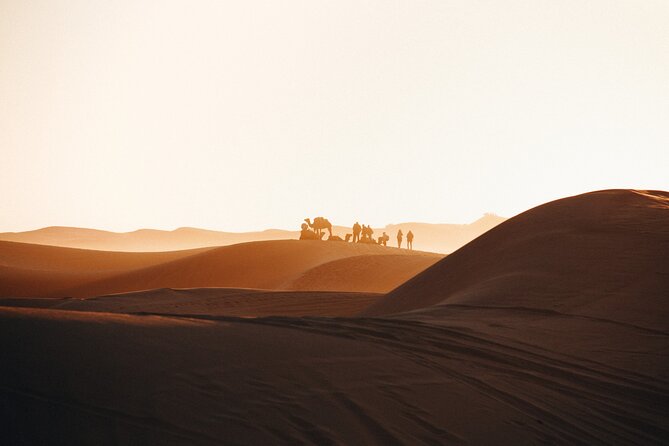 2 Days Desert Private Luxury Couple's Retreat Camel Trek + Quad - Sunset camel riding in the Merzouga dunes