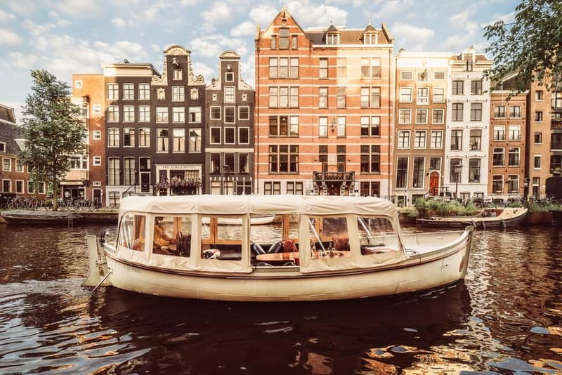 Amsterdam: Private Romantic Canal Cruise w. Prosecco/Snacks - The Amstel at sunset
