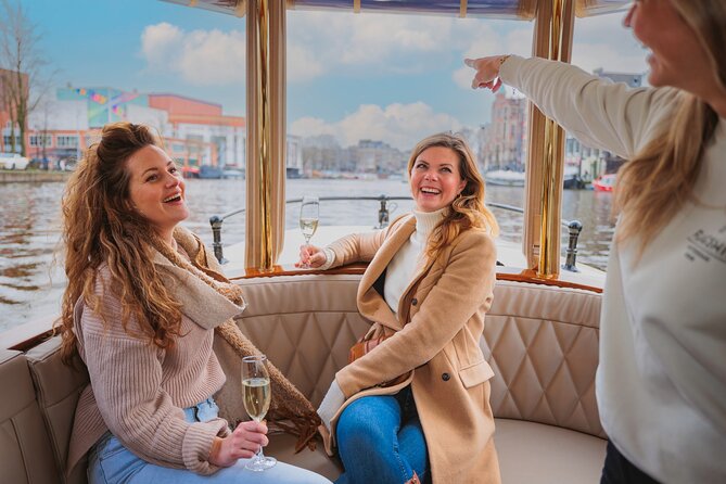 Amsterdam: Romantic Canal Cruise with Optional Bubbles & Bites - Weather, seating, and group size