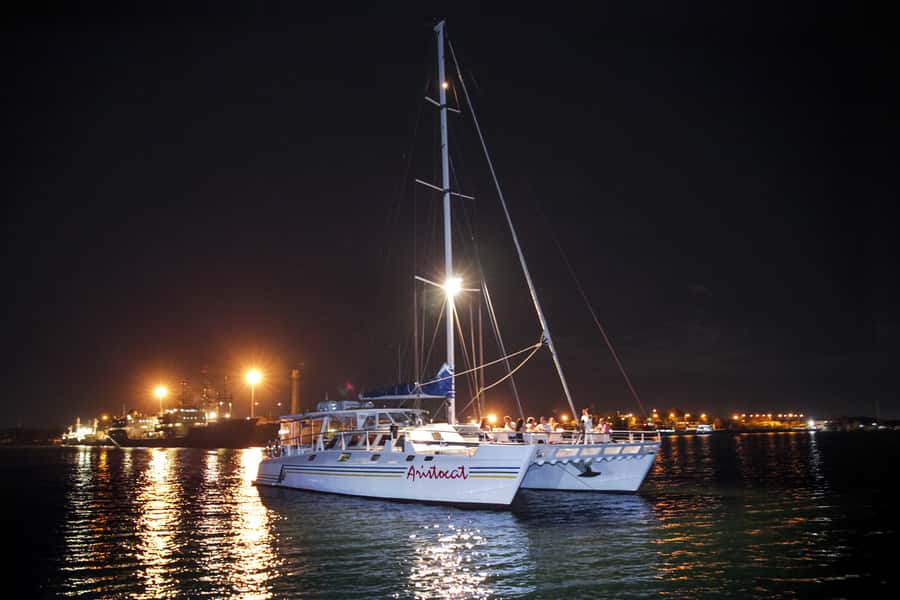 Bali/Benoa: 5-Course Romantic Evening Cruise With Live Music - Arriving at Benoa Harbor with a welcome drink