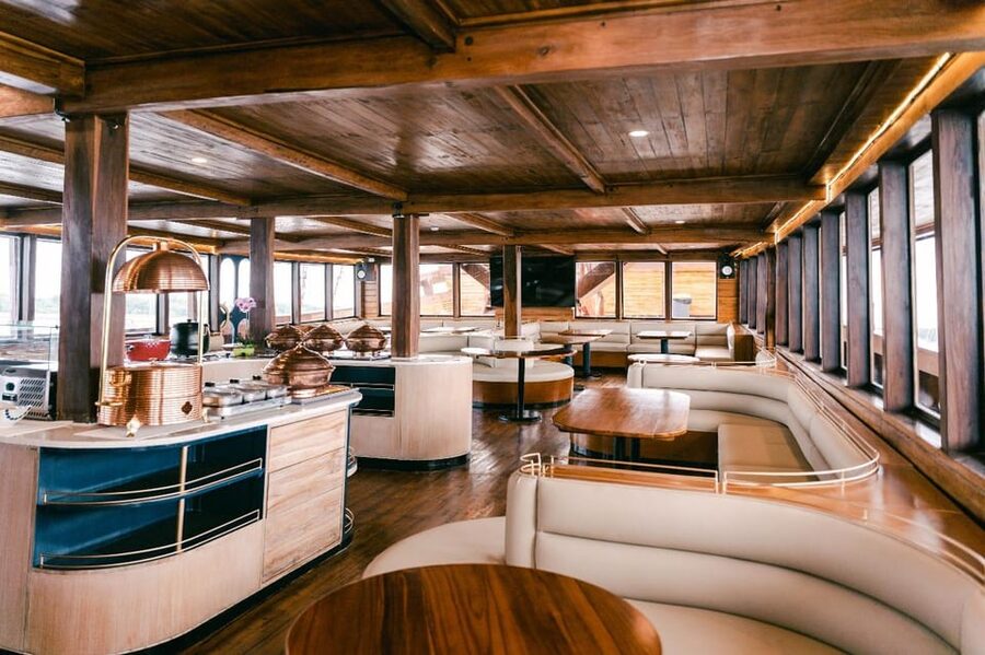 Bali Phinisi Cruise: Sunset Dinner with Live Music & Buffet - The Nusa Dua coastline at sunset