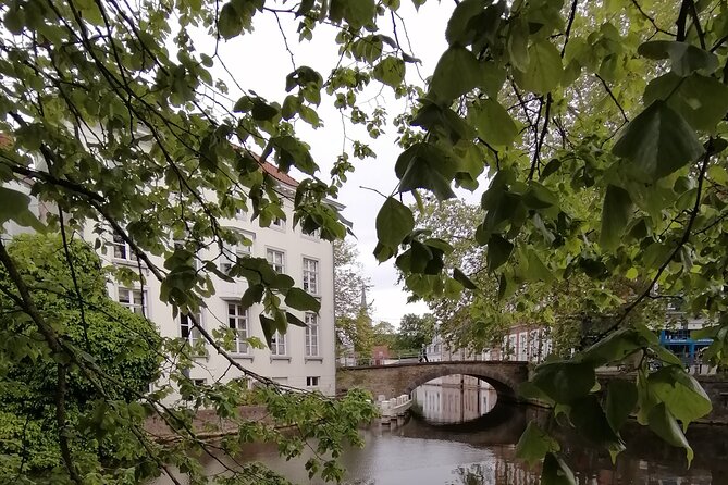 BRYGGJA ROMANTICA - 3 Hour Romantic Tour in Bruges - Poorters Loge and Bruges as a Working City
