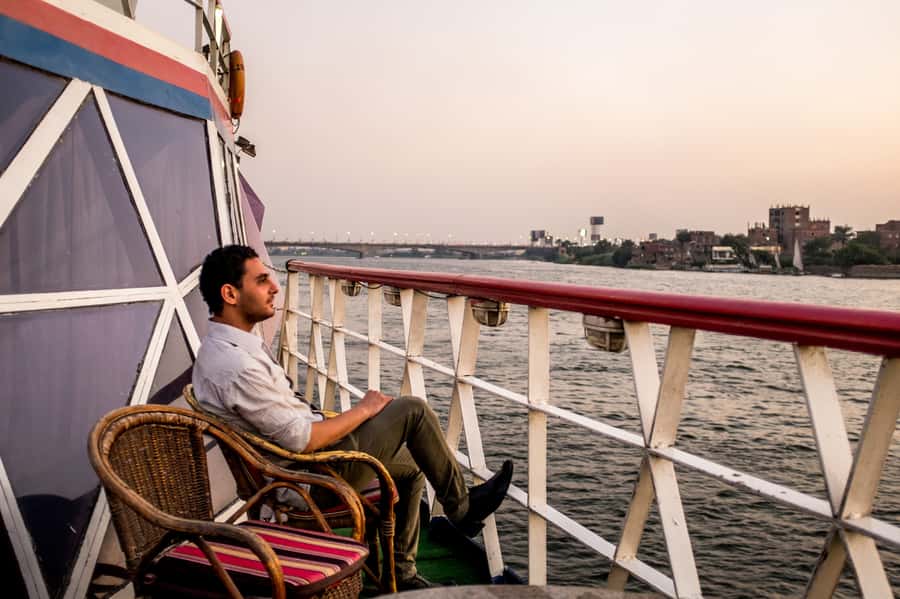 Cairo: Nile Sunset Dinner Cruise, Show & Optional Transfer - Watching Cairo turn gold, when the timing works