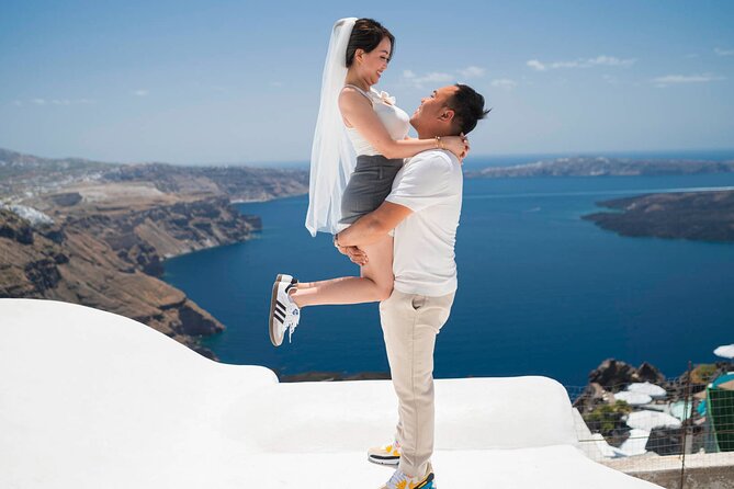 Couple and Family Photoshoot Experiece in Santorini - Blue domes and open sea views