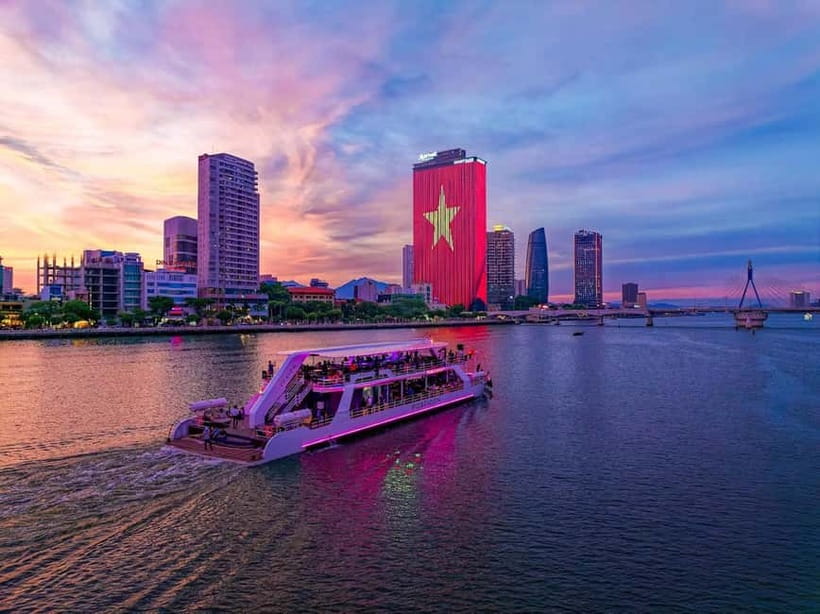 Da Nang: Experience a Magical Sunset Dinner Cruise in DN Bay - Sunset colors across Da Nang Bay