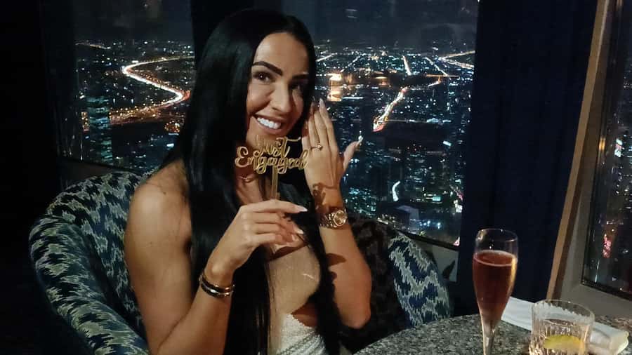 Dubai: Burj Khalifa Sunset Engagement with Porsche Pickup - A proposal planned around sunset and surprise
