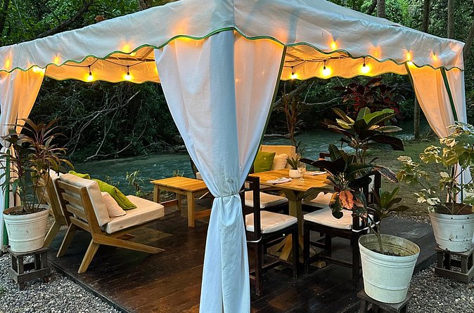 Exclusive Sunset Dinner At Reggae Hill - Reggae, firelight, and river views do the heavy lifting