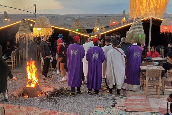 From Marrakech: Quad sunset dinner Experience & show - The Role of the Guide and Transport Team