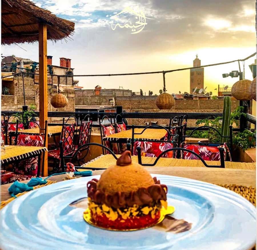 From Marrakech: Rooftop Dinner & Romantic Medina Views - Meeting your server at Al Khayma