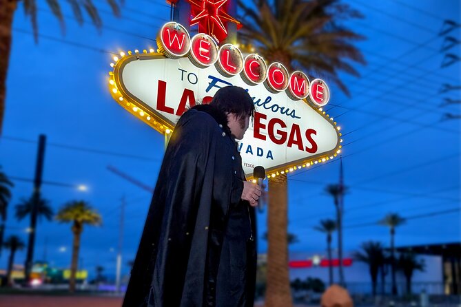 Goth Wedding or Vow Renewal at Vegas Sign with Props and Photos - Signing the Ceremonial Certificate