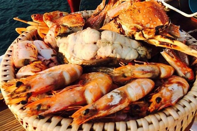Krabi Romantic Sunset Cruise with BBQ Seafood Dinner by Krabi Sea Cruise - Railay Beach: dinner with limestone scenery