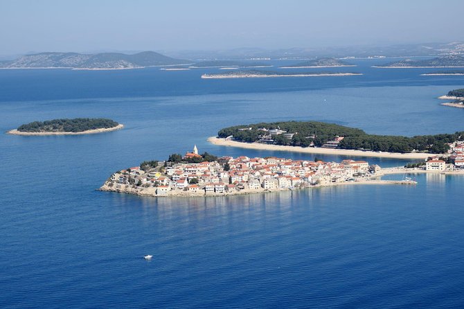 Krka waterfalls luxury tour for singles or couples - Trogir’s stone lanes and café pause