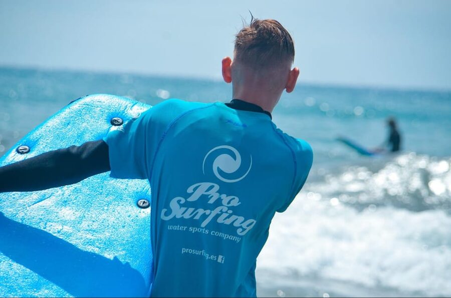 Las Palmas: Learn to Surf with a Special Price for Two Group - Getting fitted with a wetsuit and board