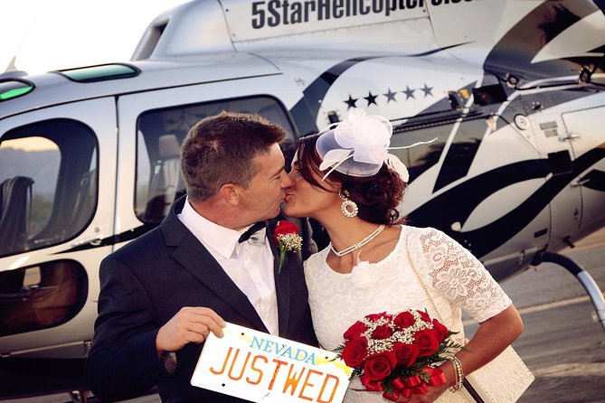 Las Vegas Night Flight Helicopter Wedding Ceremony - Saying your vows above downtown Las Vegas
