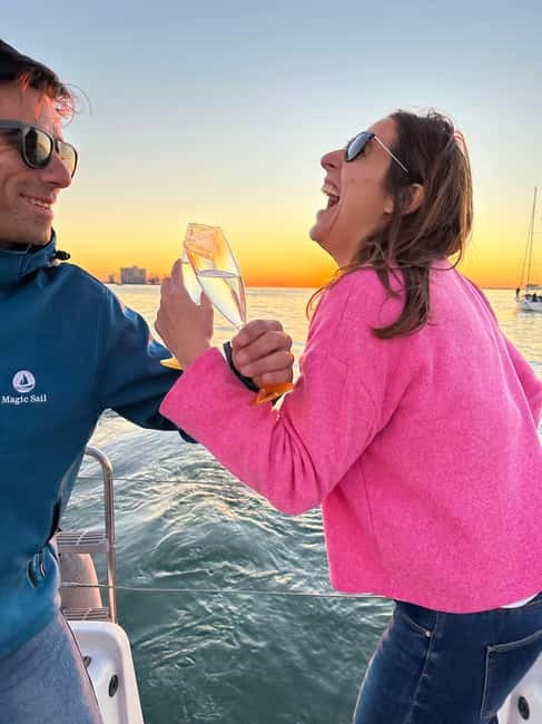 Lisbon: Romantic Cruise with Wine & Portuguese Tapas - Under the 25 de Abril Bridge