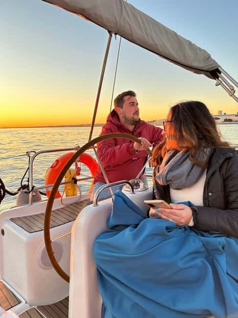 Lisbon: Romantic Cruise with Wine & Portuguese Tapas - Central Lisbon from the water