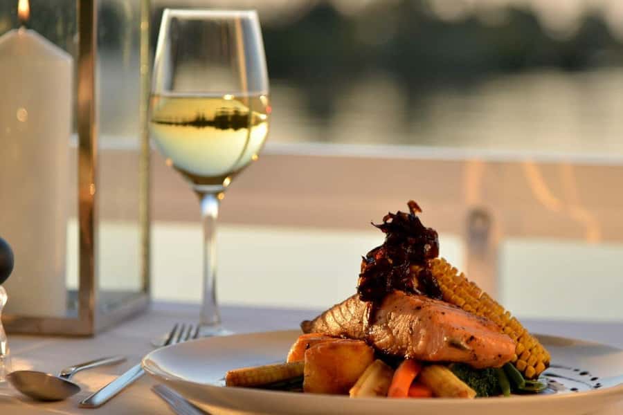 Luxury Sunset Dinner Cruise with 4-Course Meal - Cruising upstream as the afternoon cools