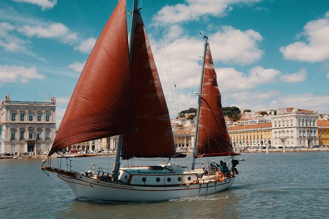 Marriage proposal on a Vintage Sailboat - Looking across to Cristo Rei and Pontal de Cacilhas