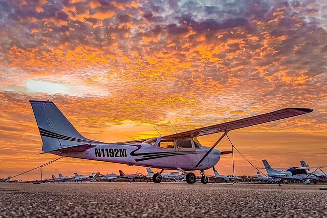 Miami Beach: Romantic Sunset Private Airplane Tour with Champagne - Pilot communication and the small-aircraft setting