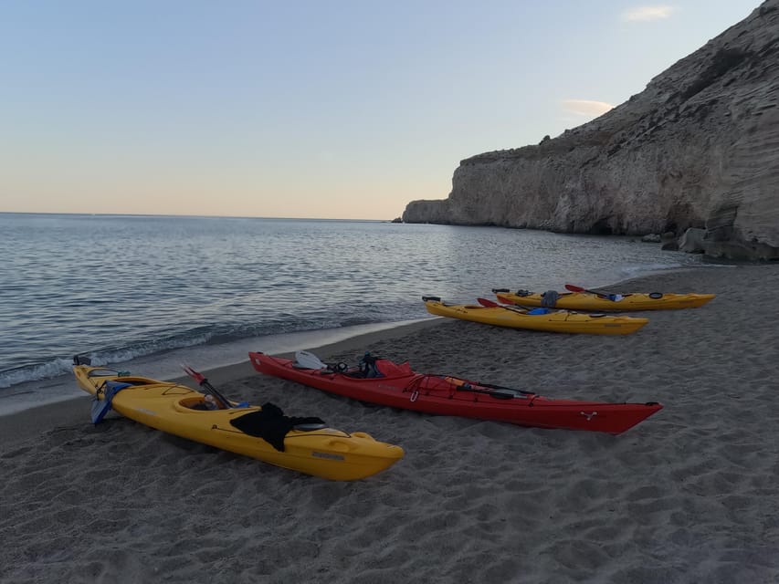 Milos: Romantic Semi Private Sunset Kayaking Tours - Inside the caves and along the volcanic rock