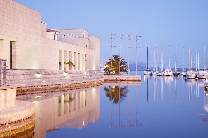 Olbia: Private Romantic Tuk-Tuk Tour - San Simplicio Basilica and granite Romanesque design