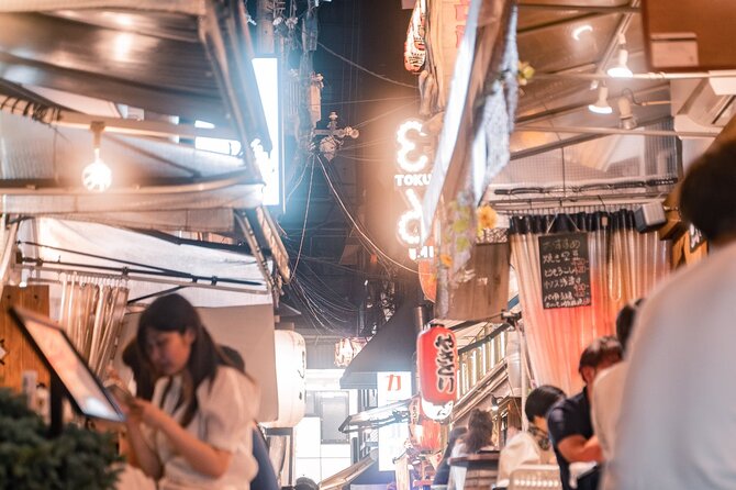 Osaka After Dark A Private Dinner Time Tour In Dotonbori & Namba - Konamon Museum connects the route to Osaka food culture