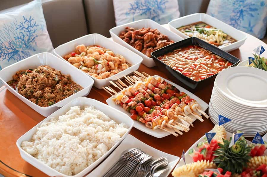 Phuket: Coral Island Day Trip and Sunset Dinner by Catamaran - From Phuket hotel to Chalong Pier