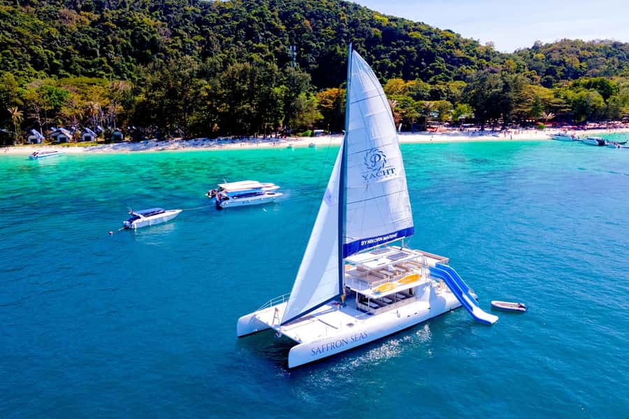 Phuket: Coral Island Day Trip and Sunset Dinner by Catamaran - Kahung Beach and the long beach stop