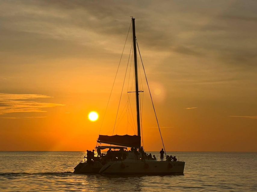 Phuket: Coral Island & Sunset Dinner by Sailing Catamaran - The catamaran ride to Koh Hey
