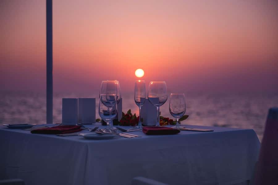Phuket: Romantic Dinner on Cape Panwa Beach - A beach table with a practical catch