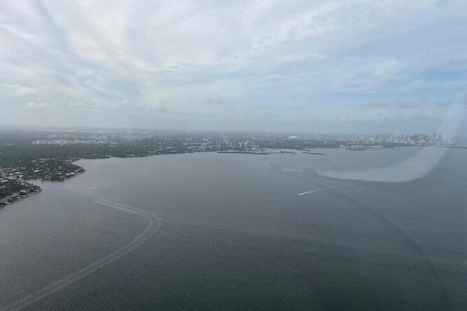 Private 60 Minute Romantic Air Tour with Champagne in Miami - Vizcaya Museum and the final return