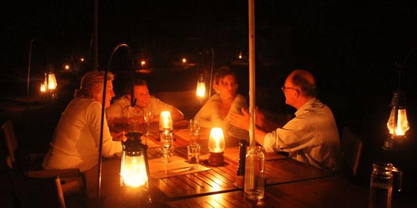 Private Jungle BBQ Dinner Experience in Yala with Transfers - A firelit dinner outside Yala