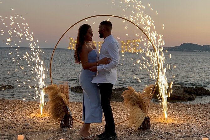 Private Marriage Proposals - The beach setup: candles, pampas grass, and glowing letters