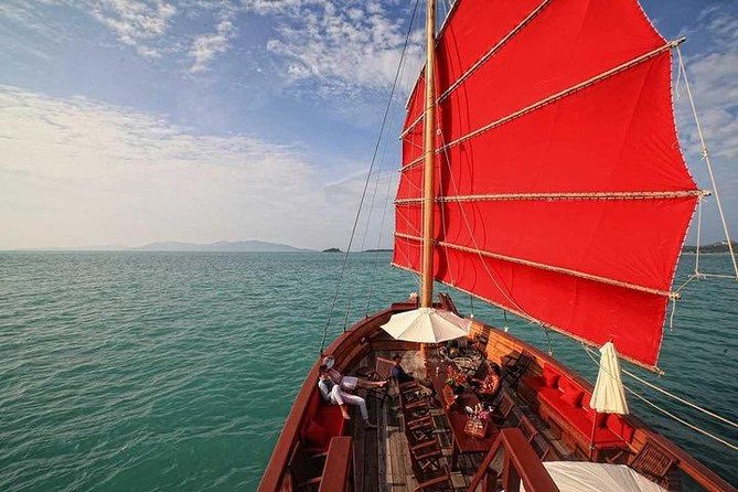 Red Baron : A Sunset Dinner Cruise from Koh Samui with Return Transfer - Booking timing, cancellation, and weather