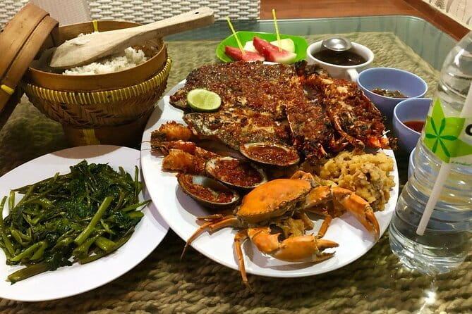 Romantic Seafood Dinner at Jimbaran Beach Bali include Sunset - A sunset table at Jimbaran Bay