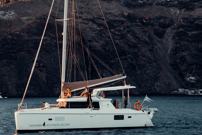 Romantic Sunset Catamaran Caldera Cruise incl. Meal & Drinks - Sailing from Santorini’s southern coast