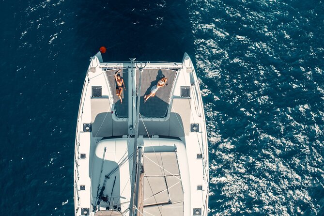 Romantic Sunset Catamaran Caldera Cruise incl. Meal & Drinks - The volcanic hot springs are warm, not magical