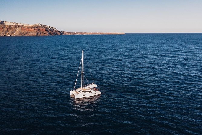 Romantic Sunset Catamaran Caldera Cruise incl. Meal & Drinks - Transfers, boarding, and the long day