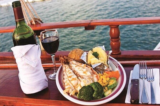 Romantic Sunset Dinner Cruising Experience - Dinner choices: lobster, steak, or both