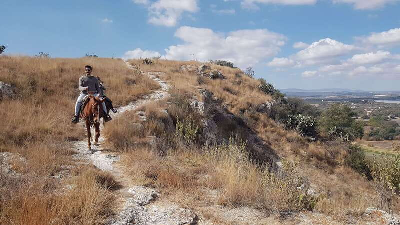 San Miguel: Romantic Horseback Riding at Sunset - Riding the hills while the sun drops