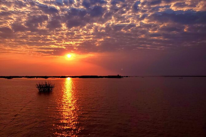 Sunset Dinner and drinks includes a Floating Village cruise tour. - Unlimited drinks add real value, with a few limits