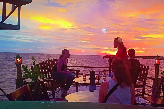 Sunset Dinner and drinks includes a Floating Village cruise tour. - The lotus farm makes a small but worthwhile first stop