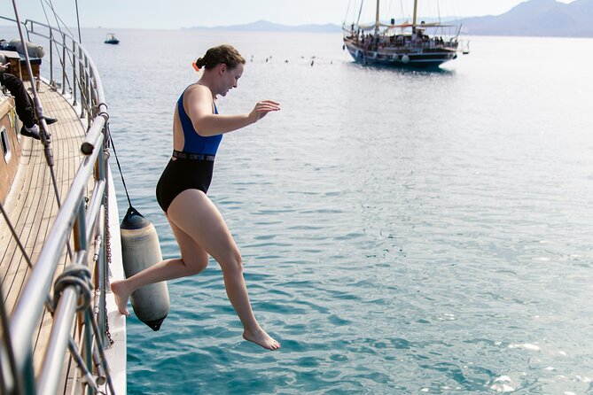 Sunset Dinner Cruise: Sunset, Swim, Drinks, and Dinner Onboard - Service, safety, and the captain’s flexibility