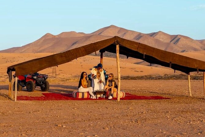 Sunset Dinner in Agafay Desert with show & Transfers - A Moroccan dinner built around tagine