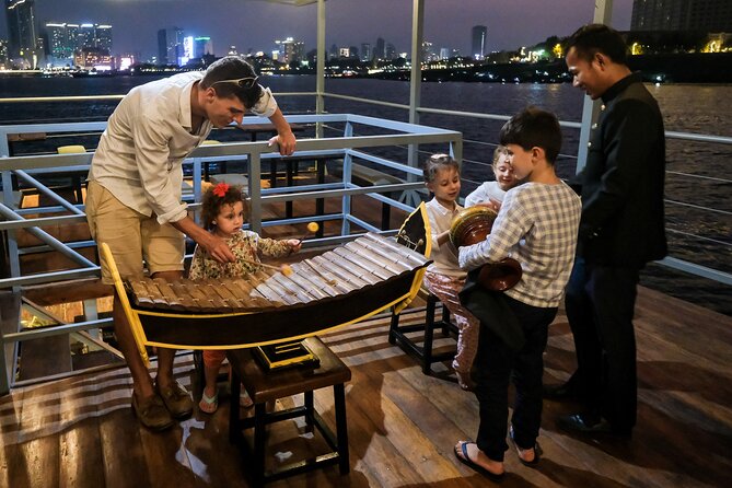 Sunset & Evening Dinner Cruise With One Way Free Pick Up - The return trip and Phnom Penh after dark