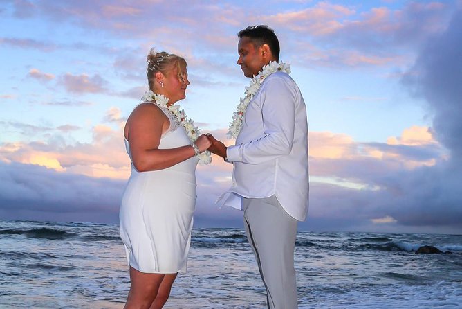 The Destination Wedding Experience Kauai - Photography, music, and floral leis add real value