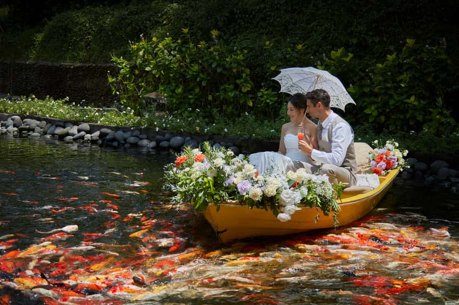 Ubud: The Original Koi Fish Yellow Boat Photo Moment - Arriving at Kamandalu Ubud