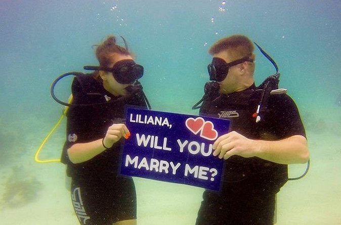 Underwater Marriage Proposal - Champagne, then a catamaran along the coast