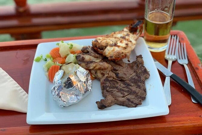 Your Romantic Dinner in Cancun, includes national open bar and live music - Dinner choices from lobster to vegetarian plates