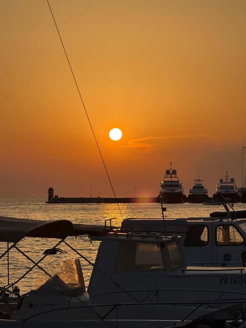 Zadar: Romantic Sunset Boat Tour with Champagne - Under the bridge and toward the old town